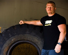 Strongman Eric Todd with tire