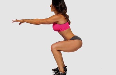 Martial artist Jennifer Dietrick performing an air squat