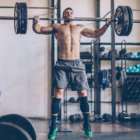 male athlete snatching in a crossfit gym / myhmb blog ways to boost your gym performance by Mike 'Kujo' Kurzeja