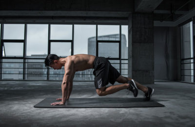 Man performing mountain climbers / myHMB blog Ways to Improve Mobility by Spenser Remick