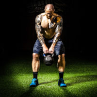 Man performing a kettlebell swing / Why the Kettlebell Swing is king myhmb blog by Brad Gillingham