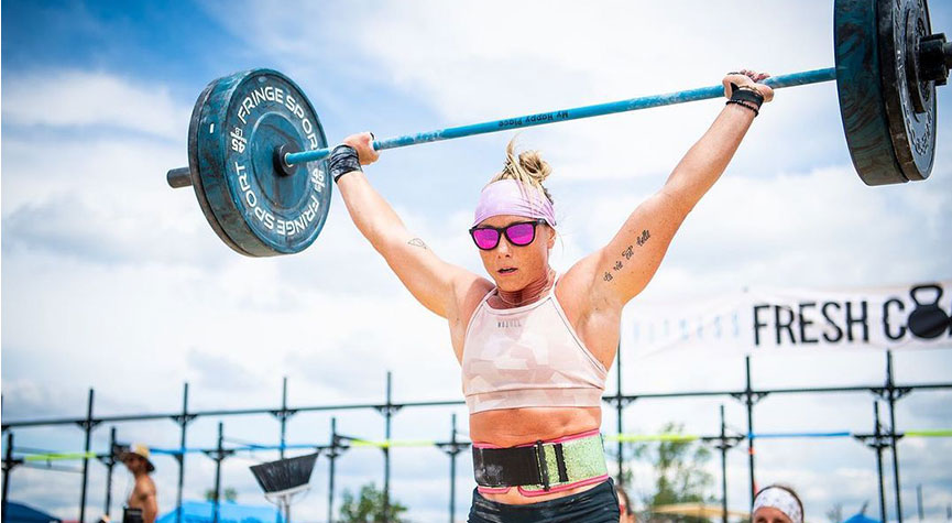 Danielle Dunlap competing at the CrossFit Games performing a snatch
