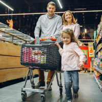 How to Shop for Muscle Health | myHMB blog | family of three in a supermarket shopping for groceries