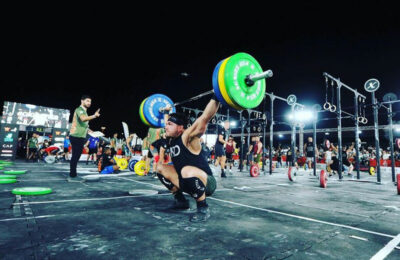 team myHMB athlete and CrossFit athlete Rob Schillaci competing and performing a squat snatch