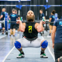 Olympic weightlifter / coach / CrossFit Games athlete Jared Enderton competing at CrossFit Regionals performing a front squat