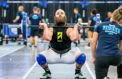 Olympic weightlifter / coach / CrossFit Games athlete Jared Enderton competing at CrossFit Regionals performing a front squat