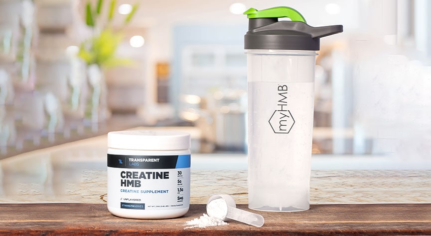 Nutritional supplement Transparent Labs Creatine HMB featuring the muscle health ingredient myHMB \ shake cup with the myHMB logo on it and the background is a kitchen counter top