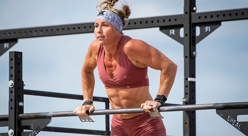 Crossfit athlete Danielle Dunlap at a CrossFit Competition performing bar muscle-ups